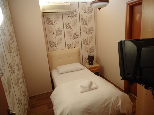 Imagen de la habitación del Hotel Signature Idea. Foto 7