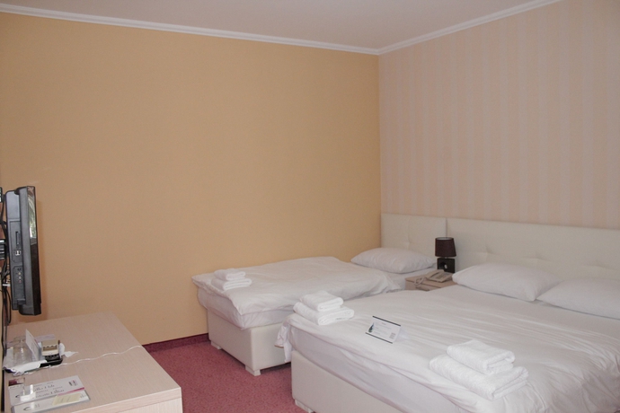 Imagen de la habitación del Hotel Signature Idea. Foto 8