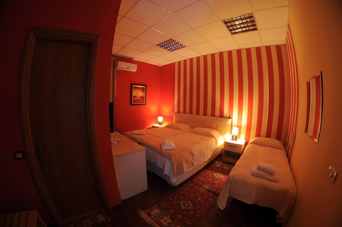 Imagen de la habitación del Hotel Signature Idea. Foto 9