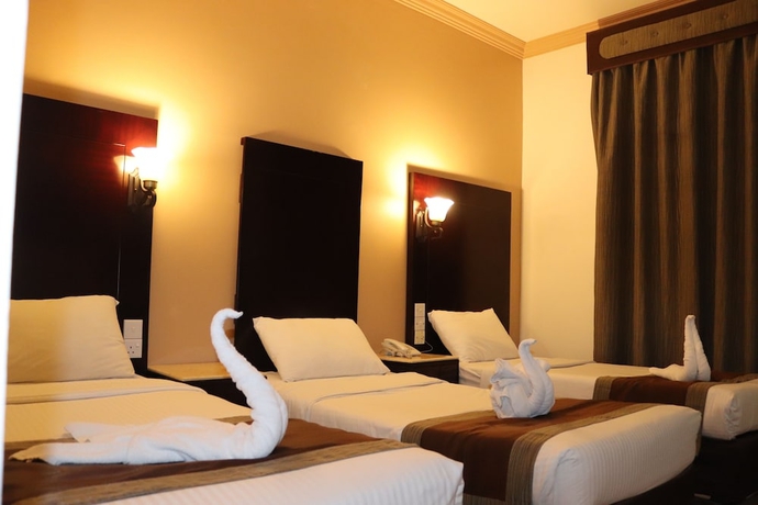 Imagen de la habitación del Hotel Signature Inn Deira. Foto 3