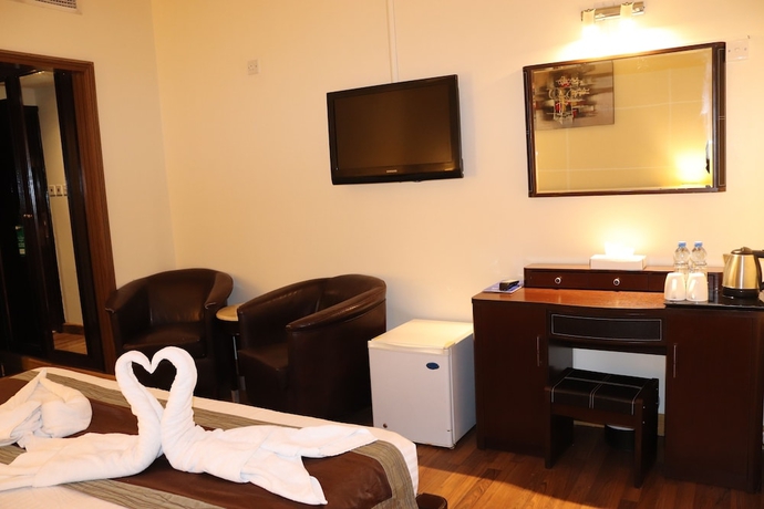 Imagen de la habitación del Hotel Signature Inn Deira. Foto 10