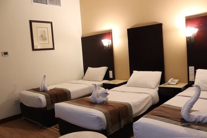 Imagen de la habitación del Hotel Signature Inn Deira. Foto 13