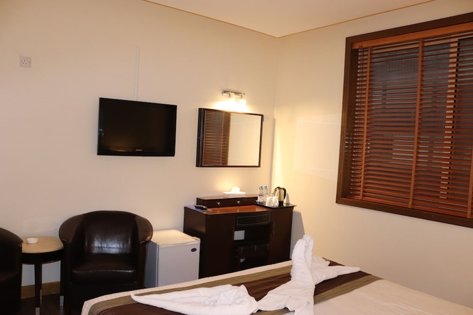 Imagen de la habitación del Hotel Signature Inn Deira. Foto 15