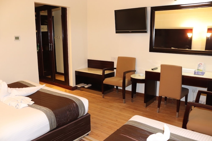 Imagen de la habitación del Hotel Signature Inn Deira. Foto 16