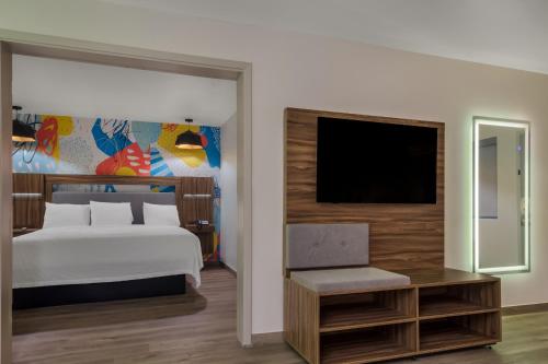 Imagen de la habitación del Hotel Signature Inn Houston Galleria. Foto 13