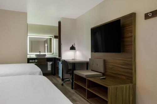 Imagen de la habitación del Hotel Signature Inn Houston Galleria. Foto 15