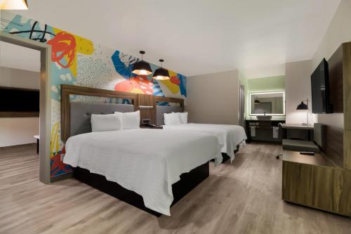 Imagen de la habitación del Hotel Signature Inn Houston Galleria. Foto 16