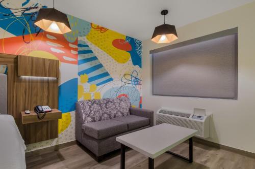 Imagen de la habitación del Hotel Signature Inn Houston Galleria. Foto 17