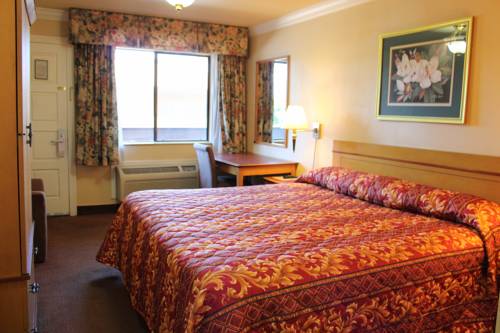 Imagen de la habitación del Hotel Signature Inn San Jose. Foto 2