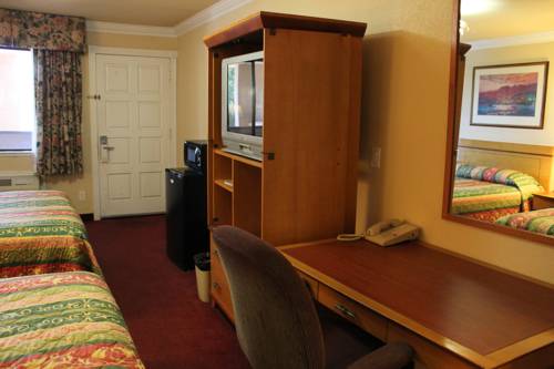 Imagen de la habitación del Hotel Signature Inn San Jose. Foto 9