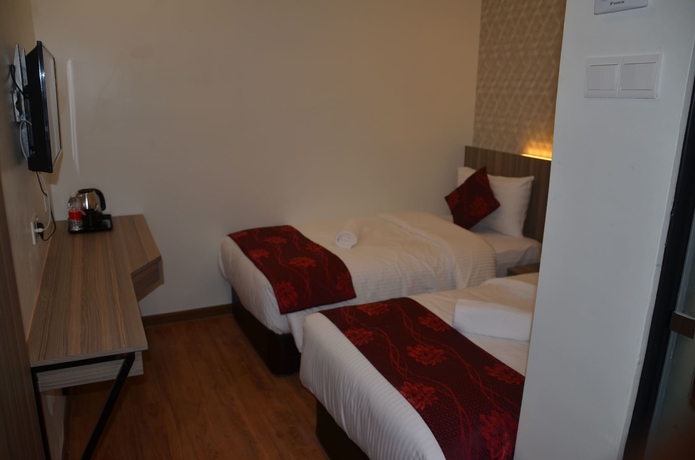 Imagen de la habitación del Hotel Signature International At Pudu. Foto 9