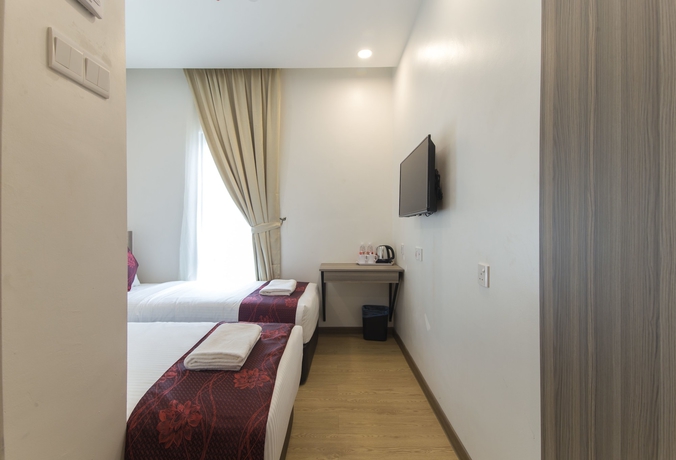Imagen de la habitación del Hotel Signature International At Pudu. Foto 13