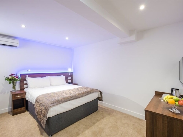 Imagen de la habitación del Hotel Signature London. Foto 7