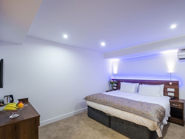 Imagen de la habitación del Hotel Signature London. Foto 8