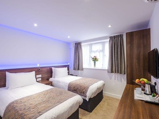 Imagen de la habitación del Hotel Signature London. Foto 10