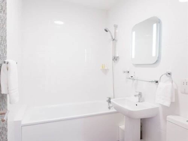 Imagen de la habitación del Hotel Signature London. Foto 12