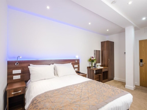 Imagen de la habitación del Hotel Signature London. Foto 13