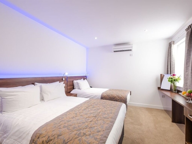 Imagen de la habitación del Hotel Signature London. Foto 15