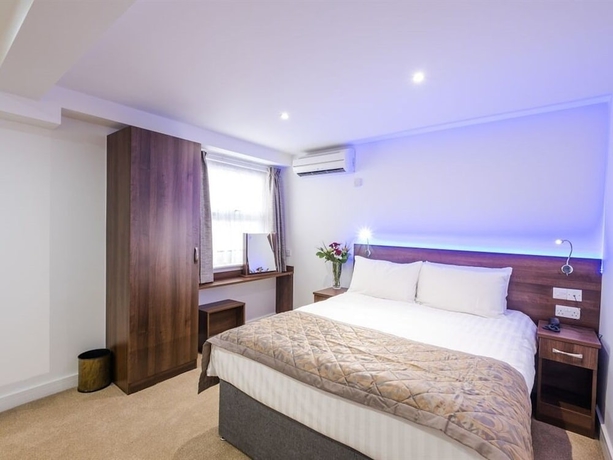 Imagen de la habitación del Hotel Signature London. Foto 18