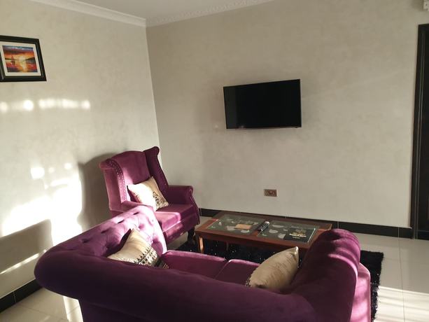 Imagen de la habitación del Hotel Signature Suites and. Foto 4
