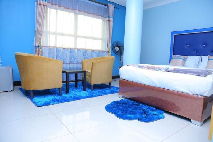 Imagen de la habitación del Hotel Signature Suites and. Foto 6