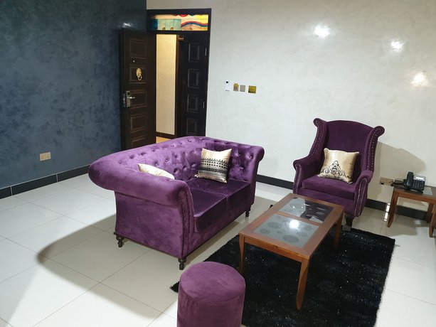 Imagen de la habitación del Hotel Signature Suites and. Foto 7