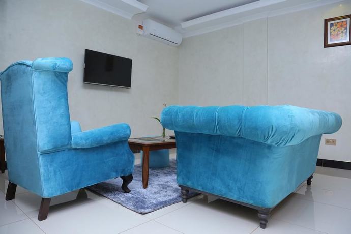 Imagen de la habitación del Hotel Signature Suites and. Foto 9