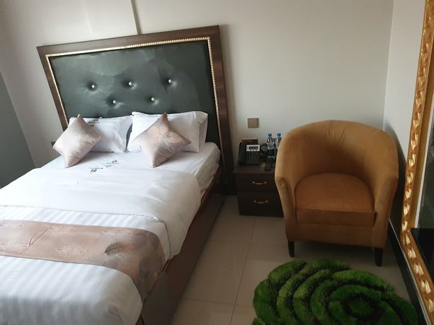 Imagen de la habitación del Hotel Signature Suites and. Foto 10