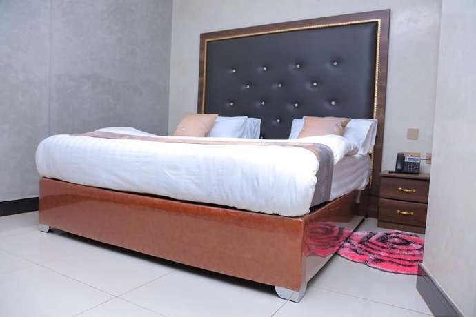 Imagen de la habitación del Hotel Signature Suites and. Foto 12