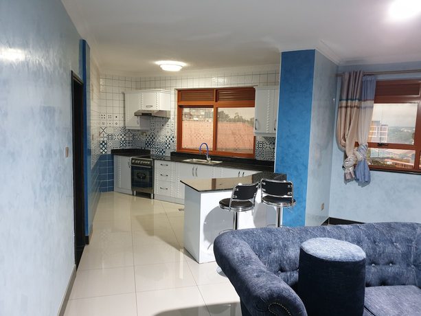 Imagen de la habitación del Hotel Signature Suites and. Foto 13
