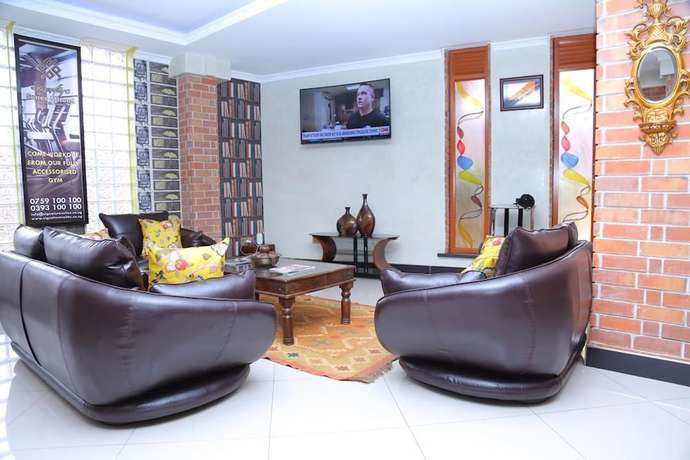 Imagen de los interiores del Hotel Signature Suites and. Foto 18