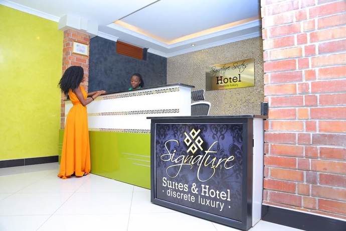 Imagen de los interiores del Hotel Signature Suites and. Foto 19