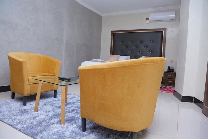 Imagen de la habitación del Hotel Signature Suites and. Foto 15