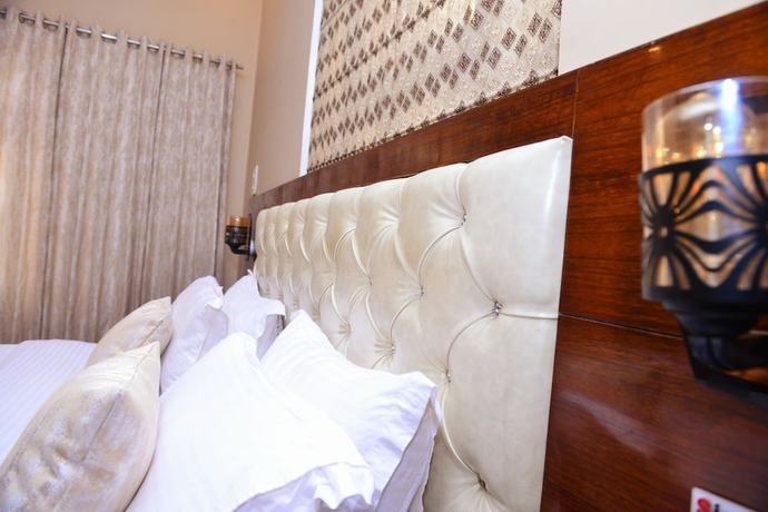 Imagen de la habitación del Hotel Signature Villa. Foto 2