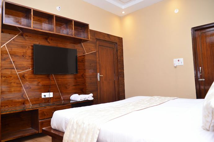 Imagen de la habitación del Hotel Signature Villa. Foto 4