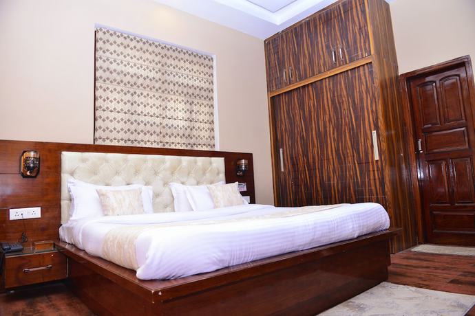 Imagen de la habitación del Hotel Signature Villa. Foto 5