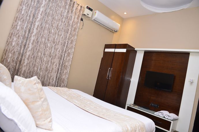 Imagen de la habitación del Hotel Signature Villa. Foto 7