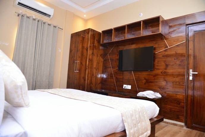 Imagen de la habitación del Hotel Signature Villa. Foto 10