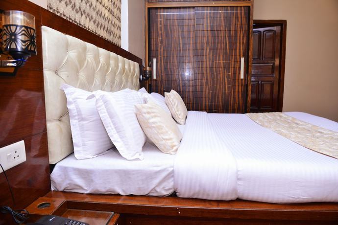 Imagen de la habitación del Hotel Signature Villa. Foto 11