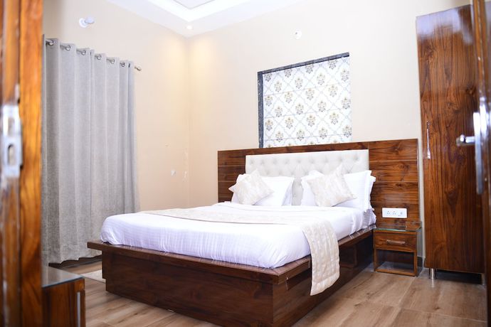 Imagen de la habitación del Hotel Signature Villa. Foto 12