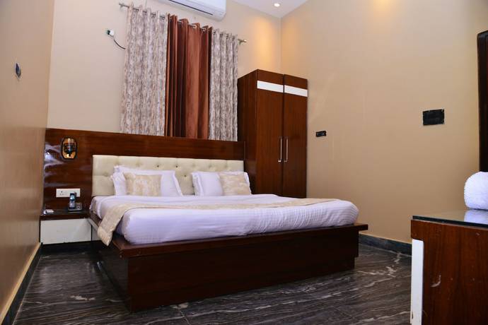 Imagen de la habitación del Hotel Signature Villa. Foto 13