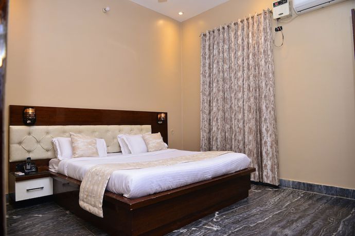 Imagen de la habitación del Hotel Signature Villa. Foto 14