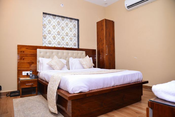 Imagen de la habitación del Hotel Signature Villa. Foto 15