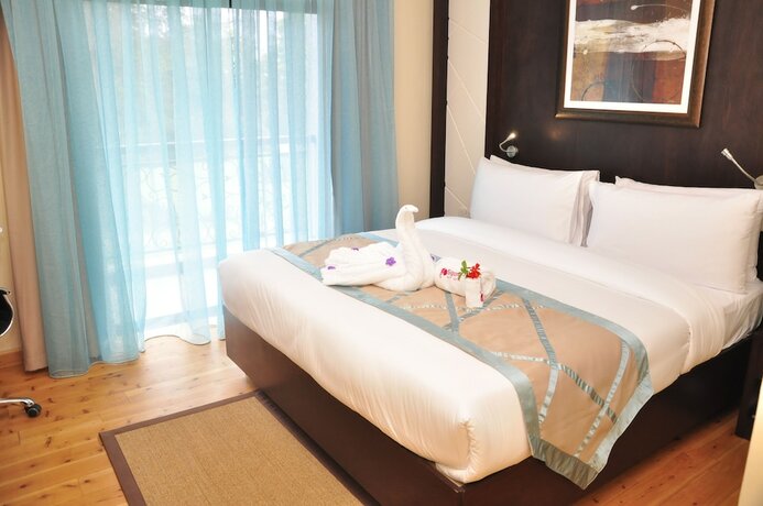 Imagen de la habitación del Hotel Sigona Golf Suites. Foto 17