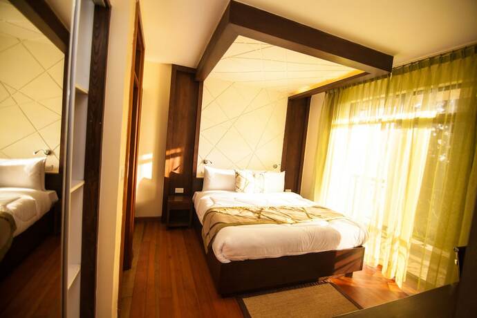 Imagen de la habitación del Hotel Sigona Golf Suites. Foto 18