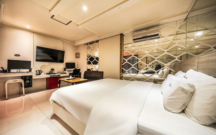 Imagen de la habitación del Hotel Siheung Seven Hertz. Foto 19