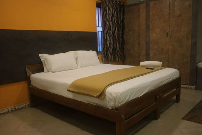 Imagen de la habitación del Hotel Sikara Kumbakonam. Foto 6