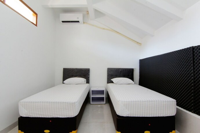 Imagen de la habitación del Hotel Silas Garden. Foto 21