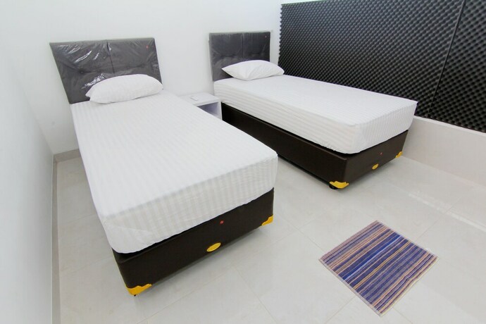 Imagen de la habitación del Hotel Silas Garden. Foto 26