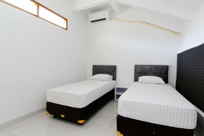 Imagen de la habitación del Hotel Silas Garden. Foto 31